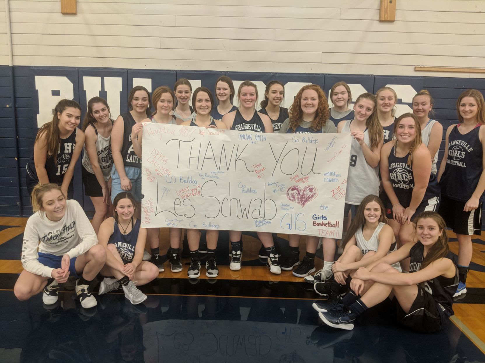 Les Schwab donates $500 to GHS girls' basketball team